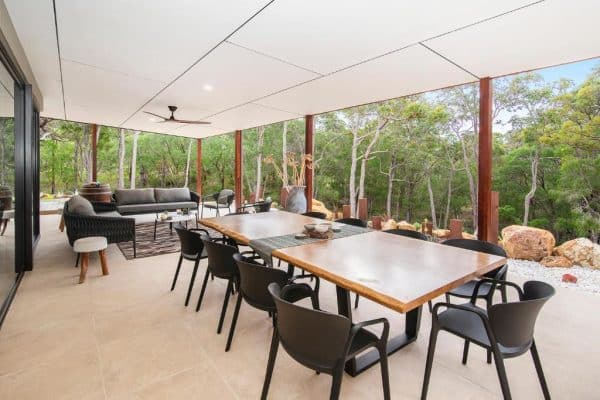 Earth & Stone Travertine pavers at a home in the bush surrounded by trees