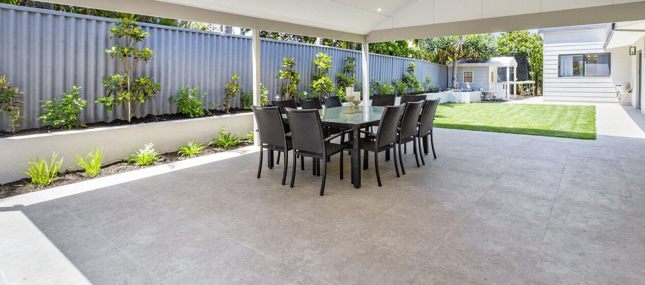 A Perth backyard with a paved patio and an outdoor setting