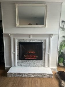 Calacatta Natural Stone Cladding around fireplace