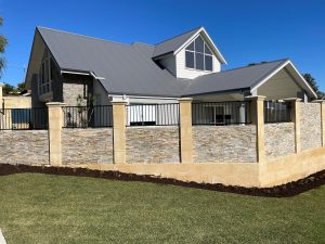 Natural Stone Cladding in Olive for external fencing