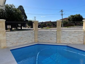 Barley Stone Veneer cladding surrounds pool